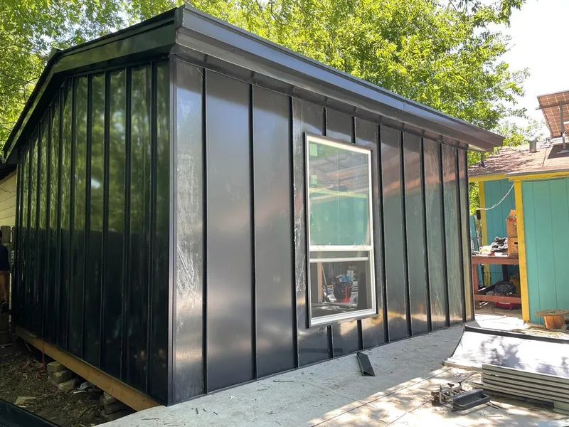 Black standing seam metal wall panels for Metal Roof Installation in Haiku-Pauwela